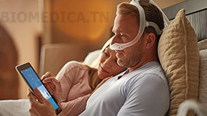 homme avec masque lit données cpap Philips DreamStation 2