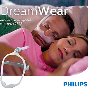 homme dort avec Masque narinaire cpap Philips DreamWear